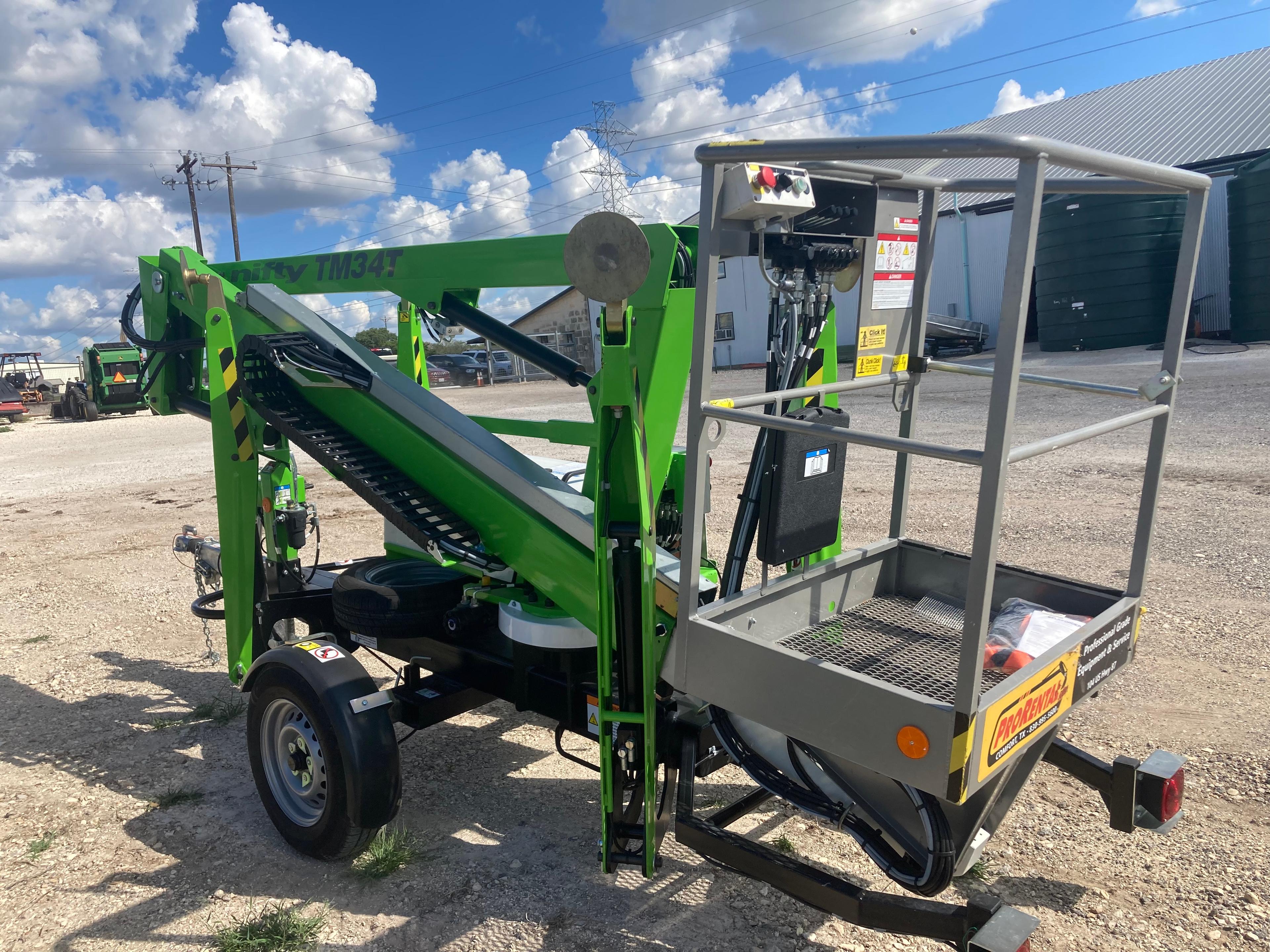 Niftylift TM34TE Tow-Behind Manlift — 40’ Working Height, 500 lb Capacity, 20’ Outreach, Electric Power, Serial #04-58478