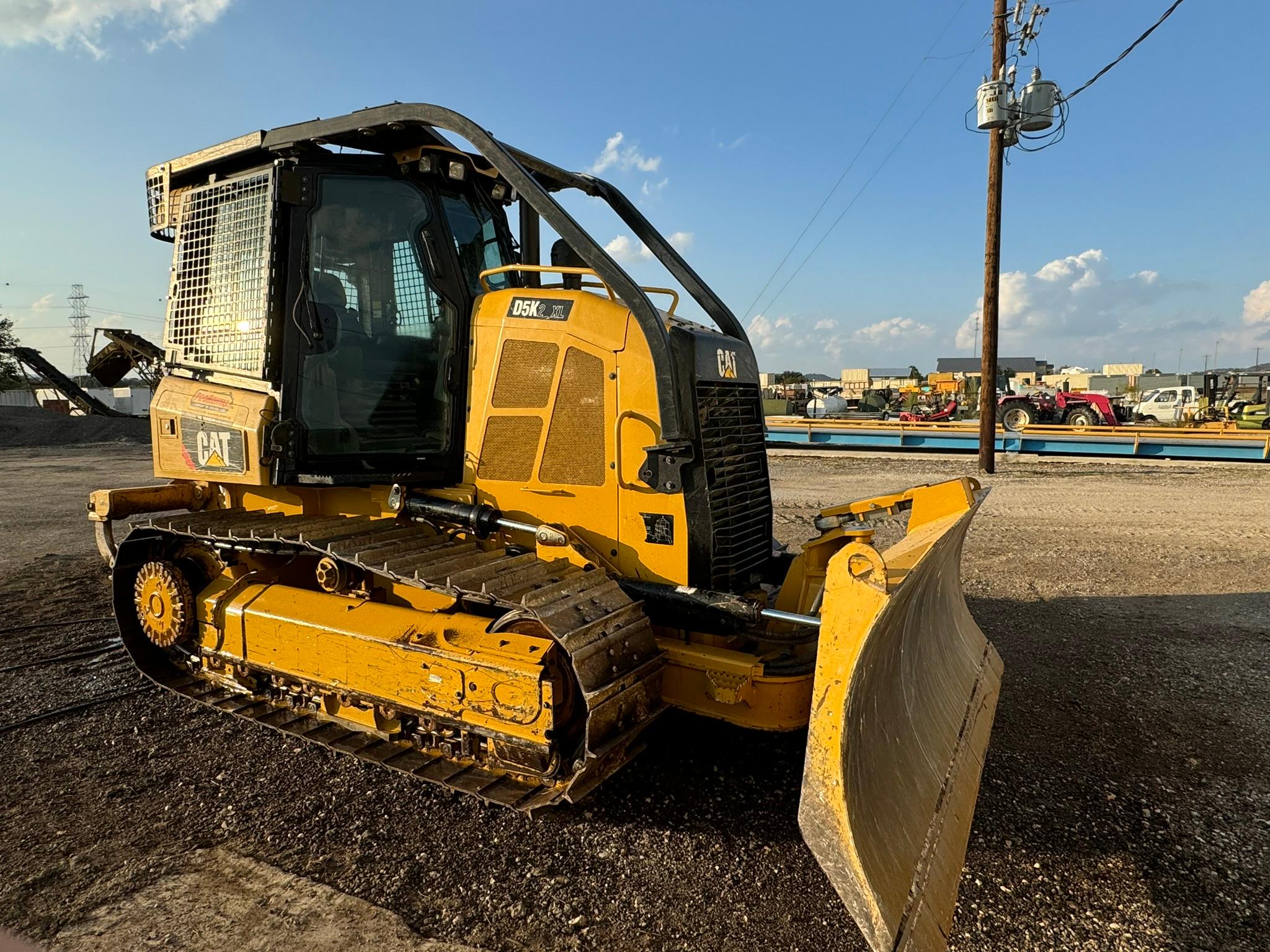 Caterpillar D5K2 XL 104HP Dozer with 9’ 6-Way Blade, Ripper, Closed Cab, Limb Risers & Window Guards